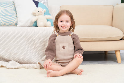 KNITTED CHOCO PULL OVER WITH BEIGE SINGLESUIT; 100% Organic Cotton; Pull Over made from GOTS-certified organic cotton; Rib finish at neck, cuffs and hem; Dropped shoulder; Relaxed fit.