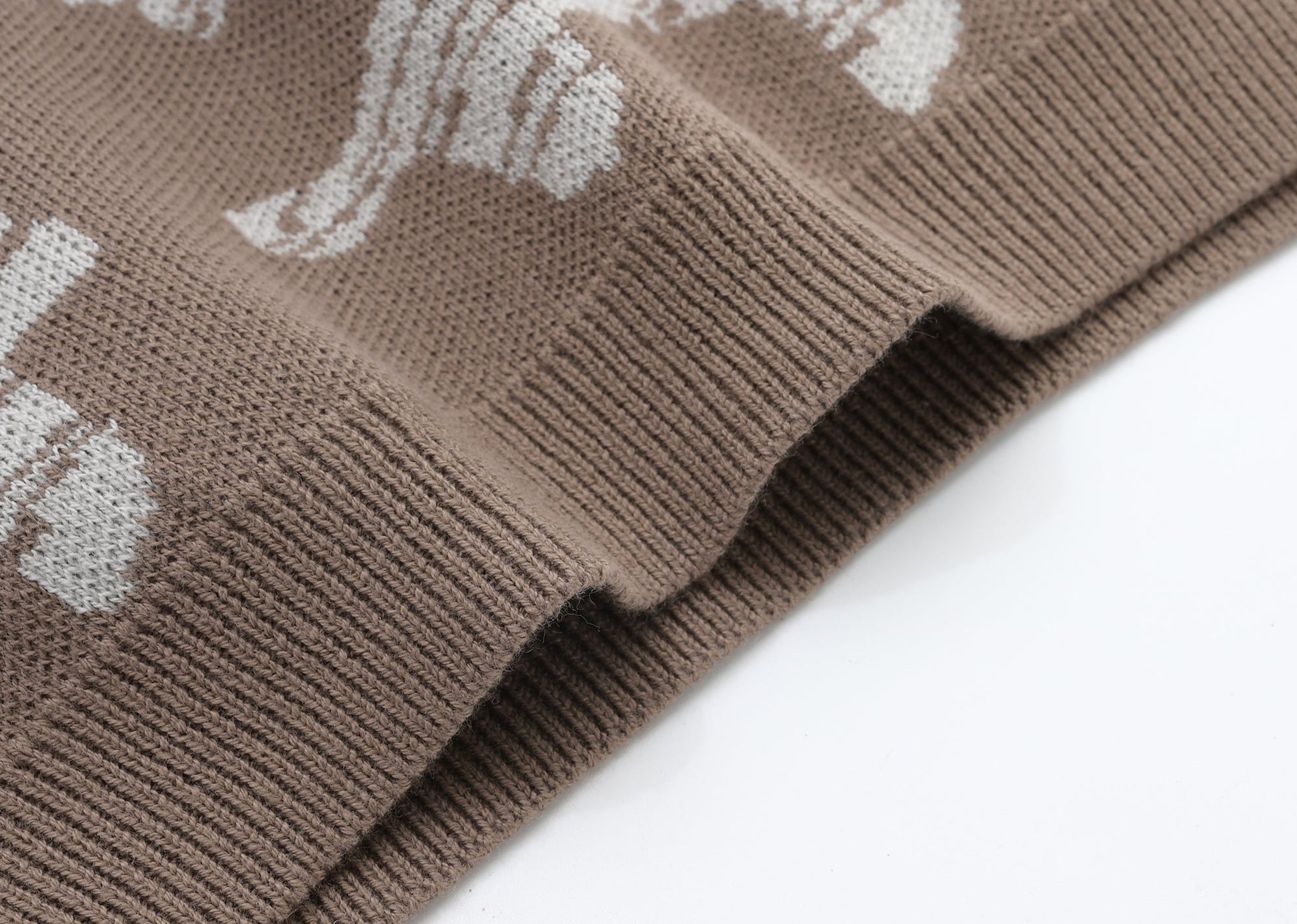 KNITTED SPOTS PULL OVER WITH PANT - CHOCO; 100% Organic Cotton; Jacquard Pull Over made from GOTS-certified organic cotton; 'Choco Spots' Jacquard pattern; Rib finish at neck, cuffs and hem; Dropped shoulder; Relaxed fit. 