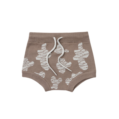 KNITTED SPOTS ROMPER WITH BLOOMERS - CHOCO; 100% Organic Cotton; Jacquard Romper made from GOTS-certified organic cotton; 'CHOCO SPOTS' Jacquard pattern; Rib hem at neck, cuffs and leg opening; Features convenient press snaps at the crotch for effortless dressing; Oversized fit.