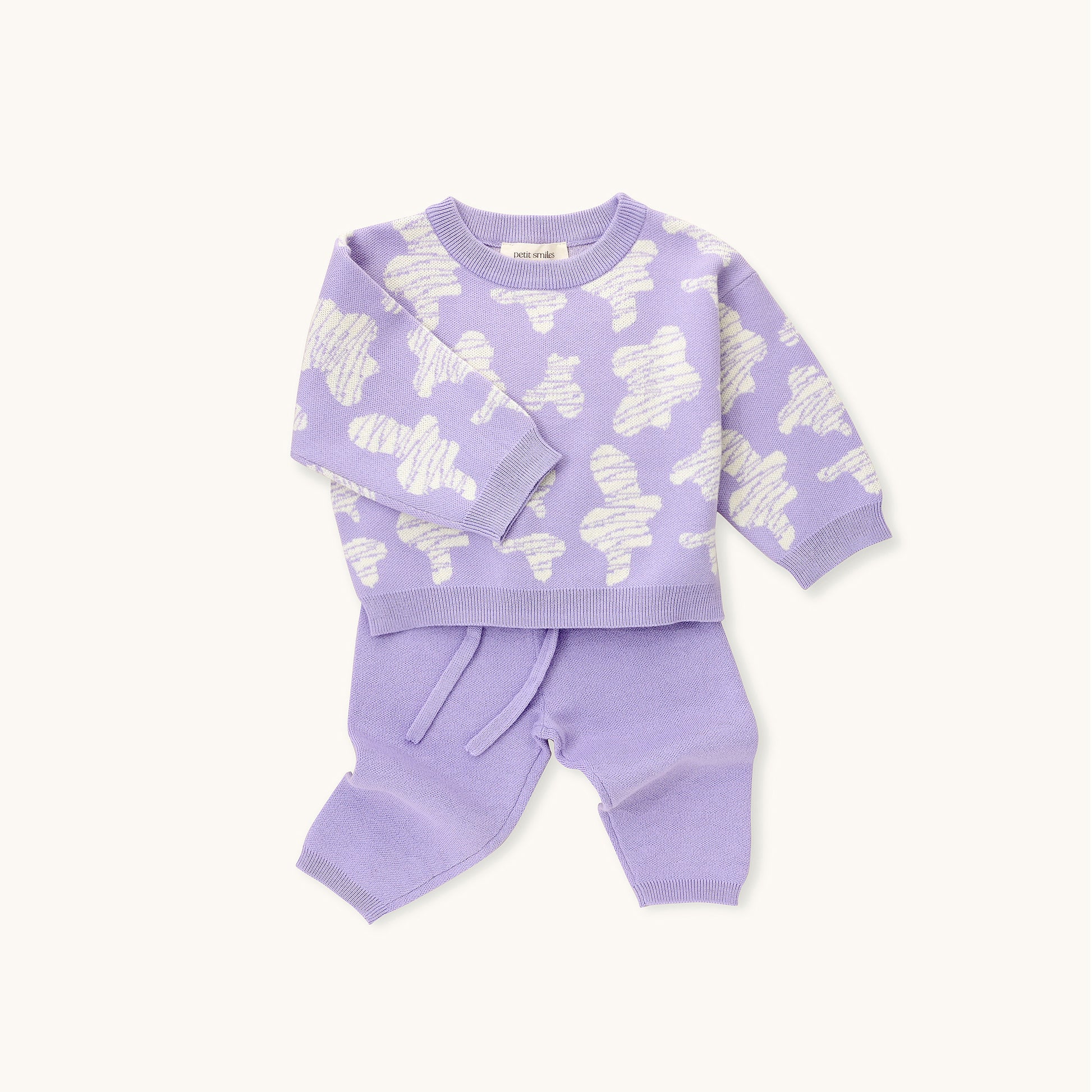 KNITTED SPOTS PULL OVER - TARO; 100% Organic Cotton; Jacquard Pull Over made from GOTS-certified organic cotton; 'Taro Spots' Jacquard pattern; Rib finish at neck, cuffs and hem; Dropped shoulder; Relaxed fit.