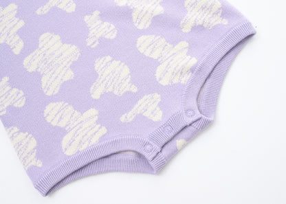 KNITTED SPOTS ROMPER WITH BLOOMERS - TARO; 100% Organic Cotton; Jacquard Romper made from GOTS-certified organic cotton; 'TARO SPOTS' Jacquard pattern; Rib hem at neck, cuffs and leg opening; Features convenient press snaps at the crotch for effortless dressing; Oversized fit.